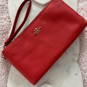 Coach Orange Pebble Leather Wristlet Clutch with Gold Logo